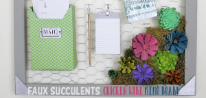 A country chicken wire frame memo board that will brighten up your kitchen with its pretty pinecone succulents. It holds useful items plus photos & quotes!