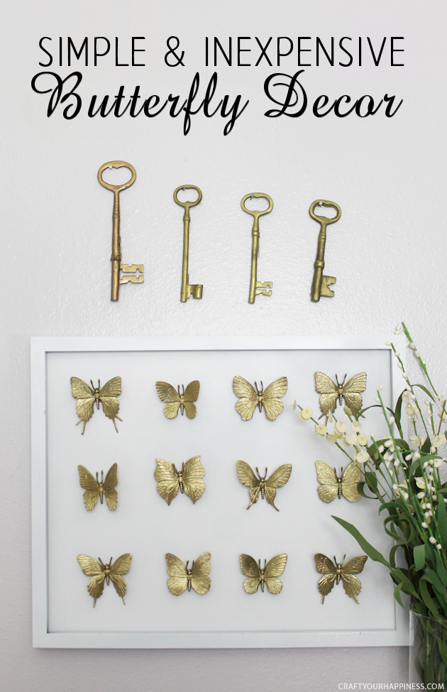 Hard to believe but this beautifully DIY framed butterfly decor piece was made with an old black frame that was missing the glass and some toy butterflies!