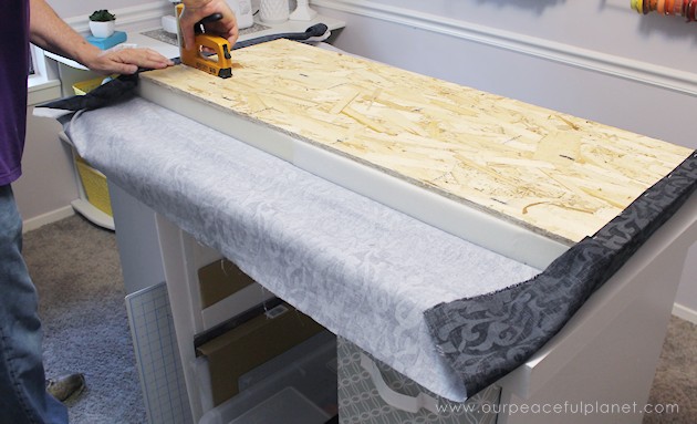 Turn a cedar chest into a window seat by making a removable DIY bench seat for it that attaches with no nails or screws. Also for pets to look out windows.