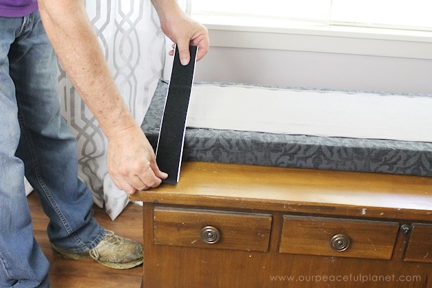 Turn a cedar chest into a window seat by making a removable DIY bench seat for it that attaches with no nails or screws. Also for pets to look out windows.