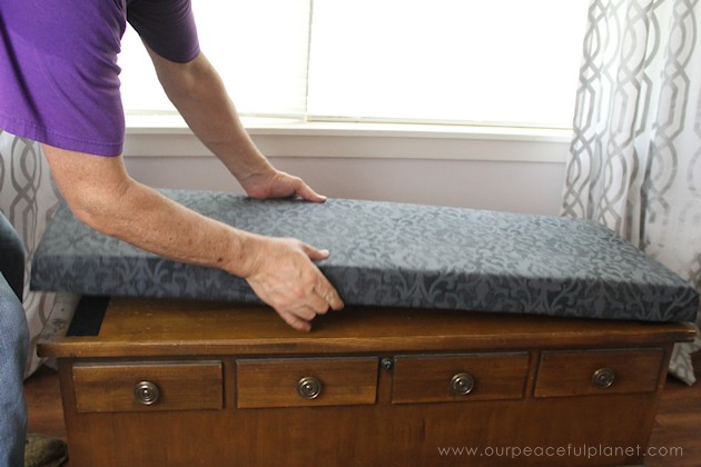 Turn a cedar chest into a window seat by making a removable DIY bench seat for it that attaches with no nails or screws. Also for pets to look out windows.