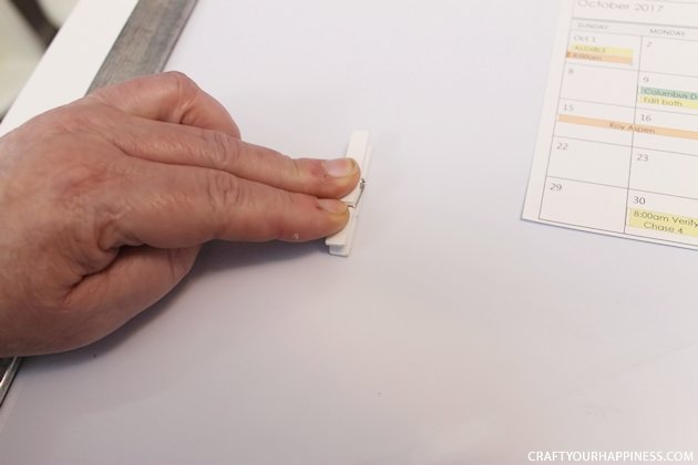 It's super easy to make any size DIY dry erase board using a roll of adhesive backed dry erase paper. We made a kitchen board and added some extras including making our own eraser!