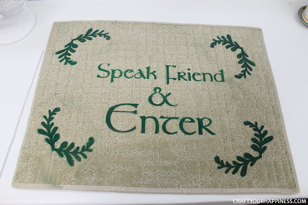 Make a custom door mat with the famous phrase from The Lord of the Rings "Speak, Friend and Enter" using our free stencil templates and some contact paper!