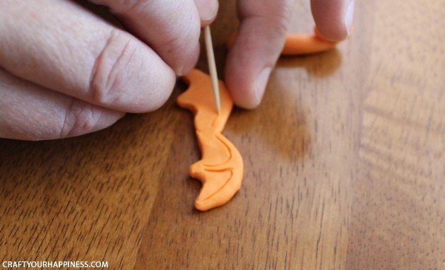 Make a cute little clay dragon that can be used as a necklace, pin, magnet or anything else you can think of. Our step by step instructions make it simple!