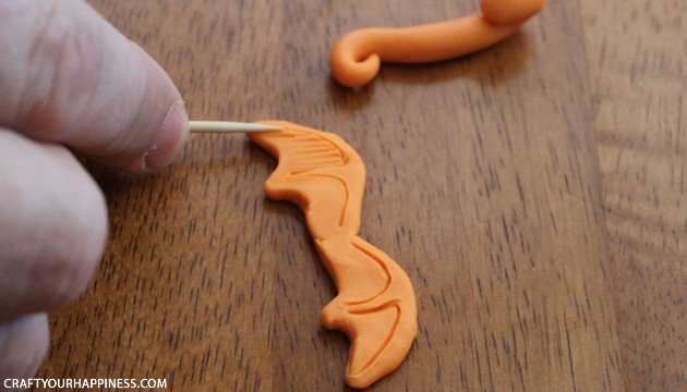 Make a cute little clay dragon that can be used as a necklace, pin, magnet or anything else you can think of. Our step by step instructions make it simple!