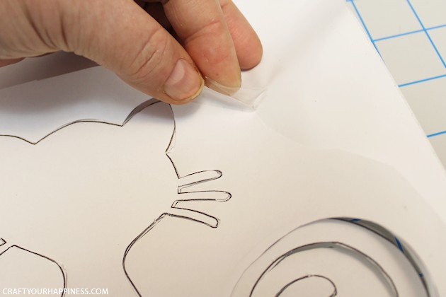 Making stencils from contact paper is cheap, lets you cut your own designs, you can make really big stencils and best of all, the stencil stays in place!