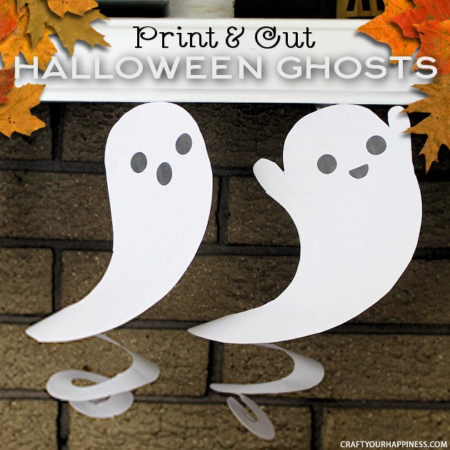 Need quick Halloween decorations? Grab our printables, some scissors or X-acto knife and before you know it you have have a room full of dangling ghosts!