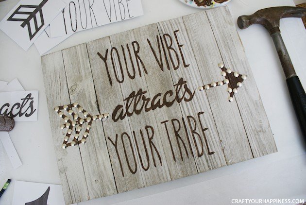 Make this Your Vibe Attracts Your Tribe plaque using our free patterns, a wood plaque, paint and thumbtacks. It's the thumbtacks that make it pop!