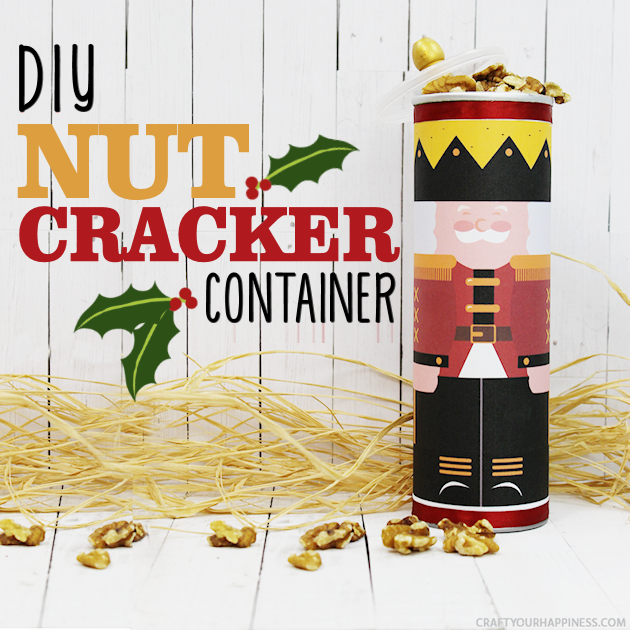 This darling DIY nutcracker container is perfect for neighbor gifts during the Christmas season. Fill it with nuts or anything else! Free printables!