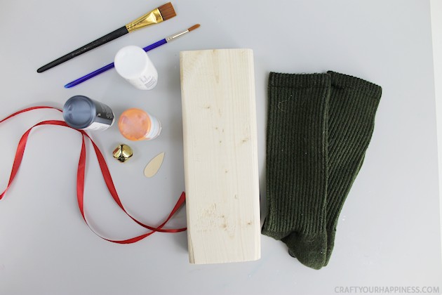 20 minutes is all you need to make this darling little inexpensive wooden snowman Christmas decor. Plus he won't melt! Great project for kids too!