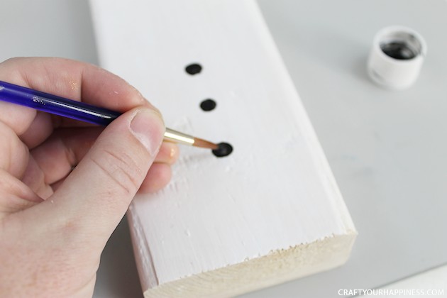 20 minutes is all you need to make this darling little inexpensive wooden snowman Christmas decor. Plus he won't melt! Great project for kids too!