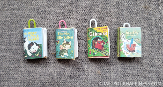 You won't believe how quick and easy it is to make miniature books with a large craft stick, some paper, glue & our free printable full of book covers!