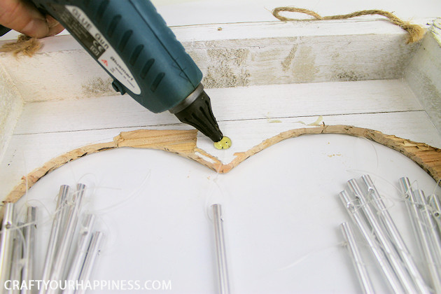 These unique farmhouse style DIY wind chimes can be hung on a wall  instead of from the eaves on your porc