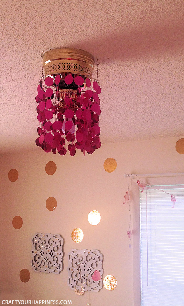 This is the one of the most simple ceiling fan makeovers ever! All you need is some ceiling party bling! Three mini hooks and voila! Gorgeous ceiling light!