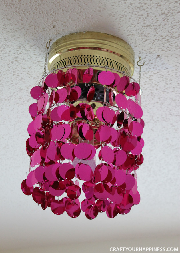 This is the one of the most simple ceiling fan makeovers ever! All you need is some ceiling party bling! Three mini hooks and voila! Gorgeous ceiling light!