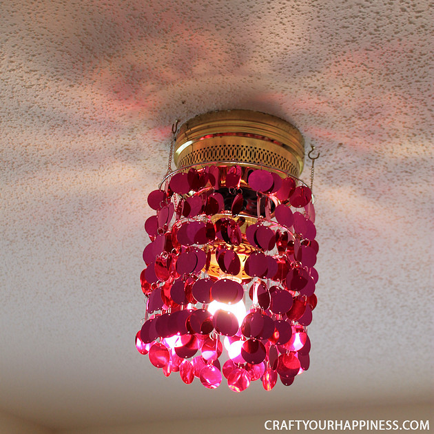 This is the one of the most simple ceiling fan makeovers ever! All you need is some ceiling party bling! Three mini hooks and voila! Gorgeous ceiling light!