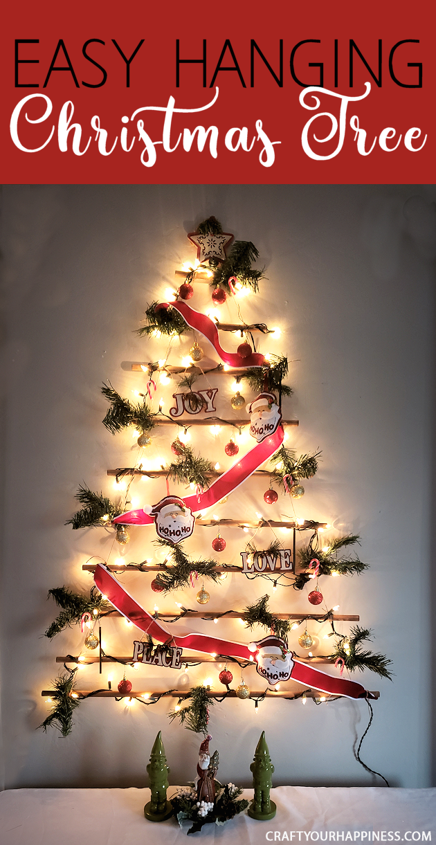 This easy DIY hanging wall Christmas tree made from dowels (or branches) is perfect if you're on a budget or you have very little space for a normal tree. 