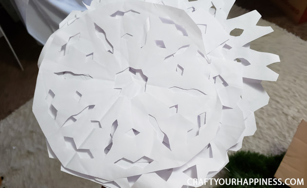Make a Winter Wonderland for Pennies using only white paper, scissors and a stapler! Twinkle lights optional.  Free Snowflake Patterns included!