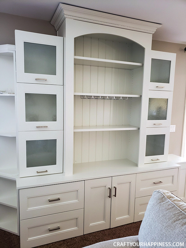  See our hutch makeover! We took an old huge black hutch and turned it into a modern beautiful hutch using paint, new hardware and a little ingenuity!