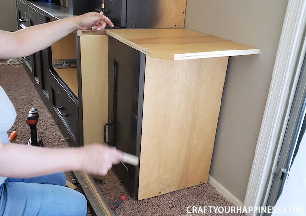  See our hutch makeover! We took an old huge black hutch and turned it into a modern beautiful hutch using paint, new hardware and a little ingenuity!