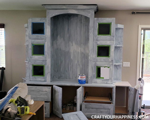  See our hutch makeover! We took an old huge black hutch and turned it into a modern beautiful hutch using paint, new hardware and a little ingenuity!