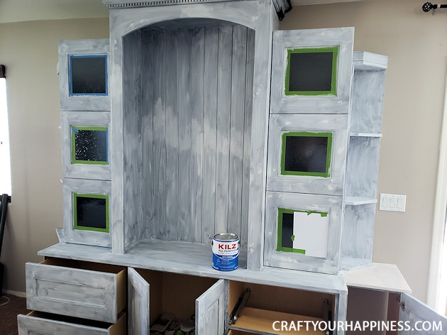  See our hutch makeover! We took an old huge black hutch and turned it into a modern beautiful hutch using paint, new hardware and a little ingenuity!