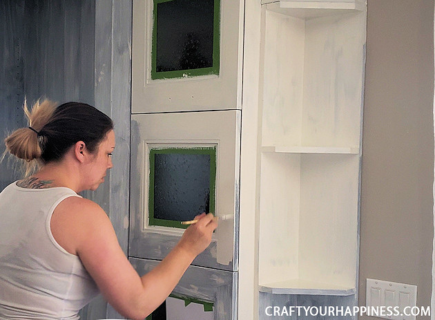  See our hutch makeover! We took an old huge black hutch and turned it into a modern beautiful hutch using paint, new hardware and a little ingenuity!