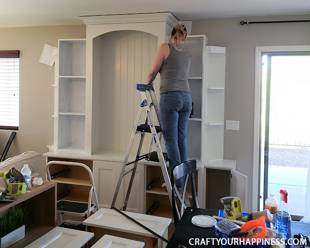  See our hutch makeover! We took an old huge black hutch and turned it into a modern beautiful hutch using paint, new hardware and a little ingenuity!