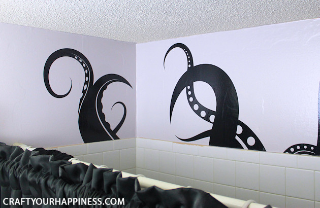 If you're looking for a unique bathroom makeover wait till you see how we turned a bleh master bathroom into a magical dark sea theme.