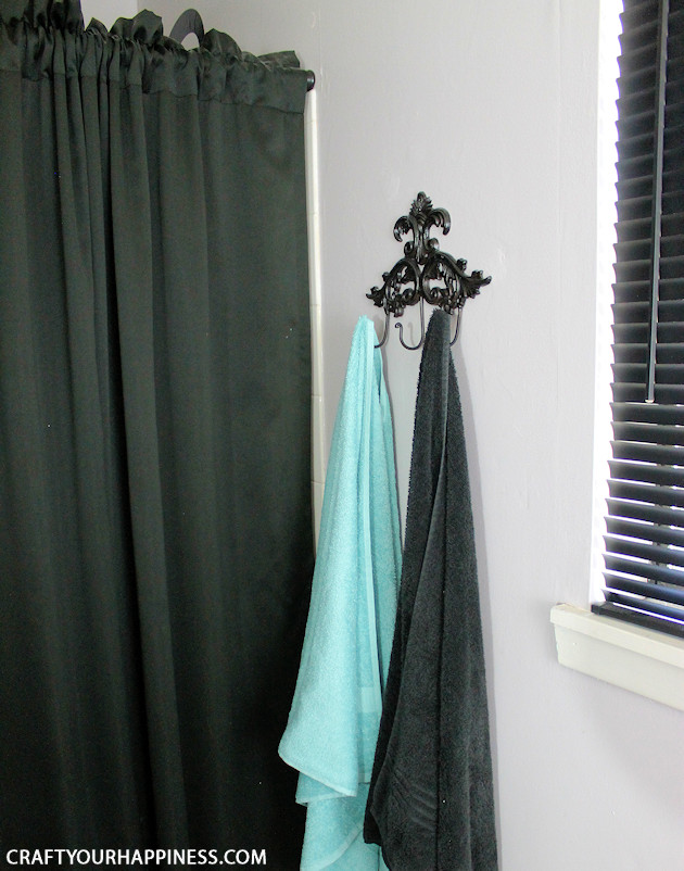 If you're looking for a unique bathroom makeover wait till you see how we turned a bleh master bathroom into a magical dark sea theme.