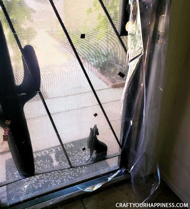 If you live where it's extremely hot or cold and have a screen door with no glass here is a fairly simple DIY removable clear screen door cover you can make for minimal cost.