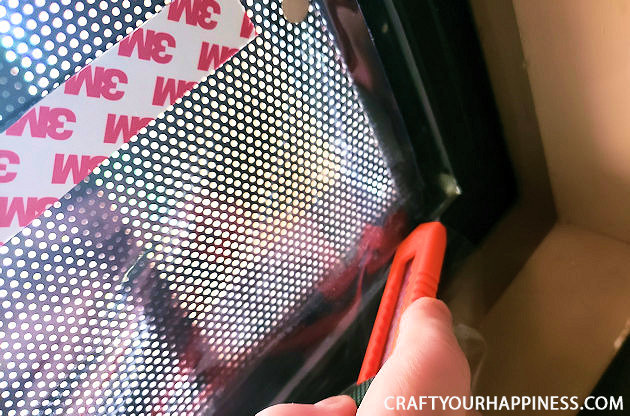 If you live where it's extremely hot or cold and have a screen door with no glass here is a fairly simple DIY removable clear screen door cover you can make for minimal cost.