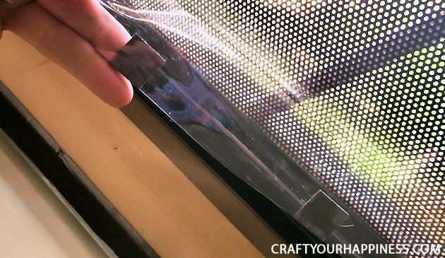 If you live where it's extremely hot or cold and have a screen door with no glass here is a fairly simple DIY removable clear screen door cover you can make for minimal cost.