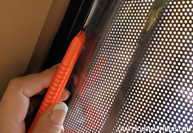 If you live where it's extremely hot or cold and have a screen door with no glass here is a fairly simple DIY removable clear screen door cover you can make for minimal cost.