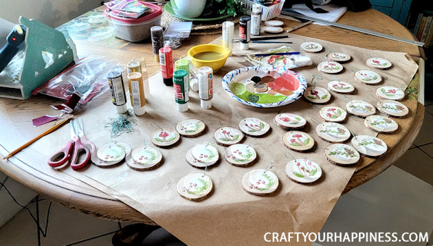 DIY paint your own wood slices Christmas ornaments for an earthy whimsical holiday vibe! You can buy the discs or cut your own!