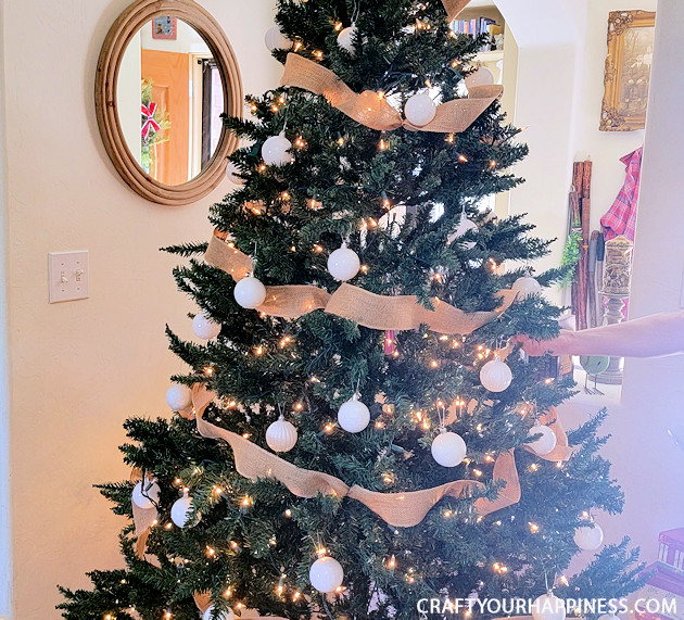 DIY paint your own wood slices Christmas ornaments for an earthy whimsical holiday vibe! You can buy the discs or cut your own!