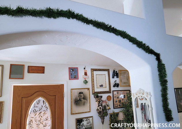 Brighten up your holiday and deck your halls by making your own fancy DIY garland from plain green garland. 