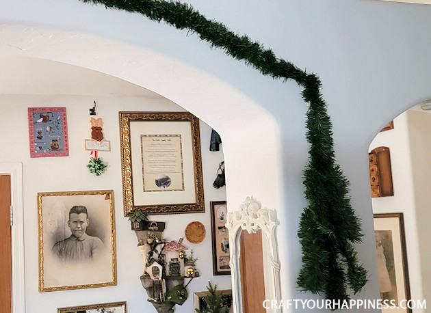 Brighten up your holiday and deck your halls by making your own fancy DIY garland from plain green garland. 