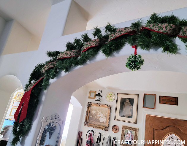 Brighten up your holiday and deck your halls by making your own fancy DIY garland from plain green garland. 