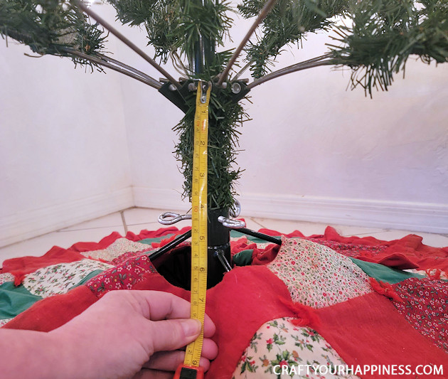 If you have an artificial Christmas tree without a fake tree trunk cover for the bottom we've got a quick inexpensive fix! We even have a printable version!
