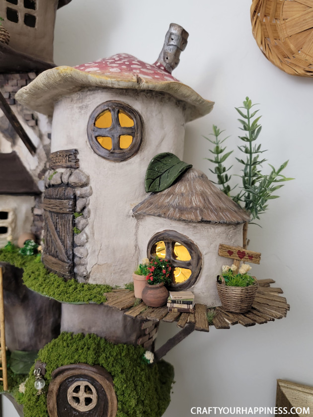 This hanging wall village sculpture is the FIRST in our new category "Get Inspired!" It's handmade from clay!