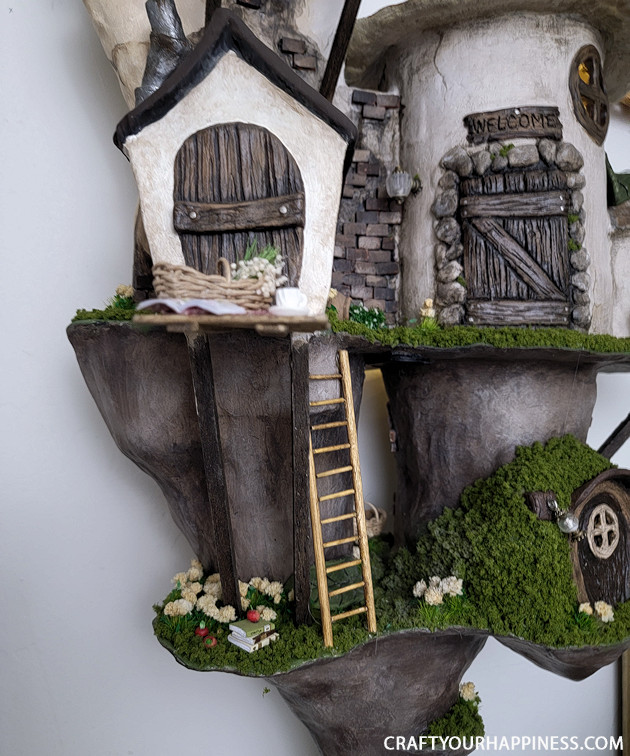 This hanging wall village sculpture is the FIRST in our new category "Get Inspired!" It's handmade from clay!