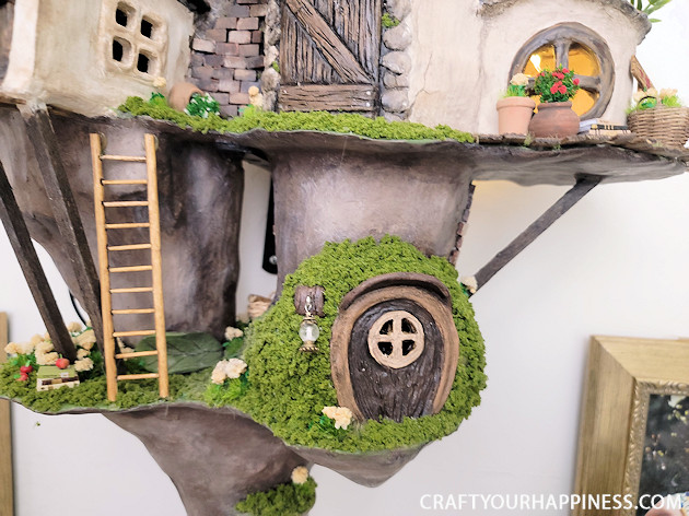 This hanging wall village sculpture is the FIRST in our new category "Get Inspired!" It's handmade from clay!
