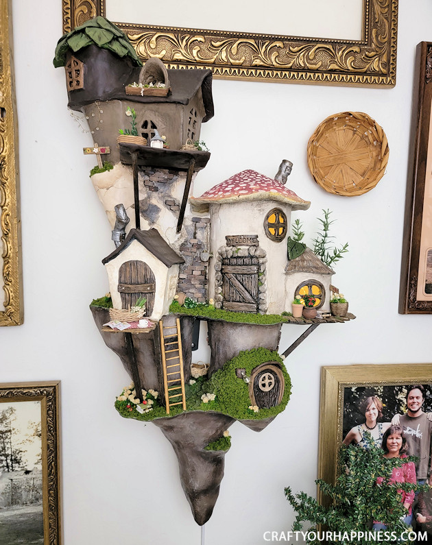 This hanging wall village sculpture is the FIRST in our new category "Get Inspired!" It's handmade from clay!