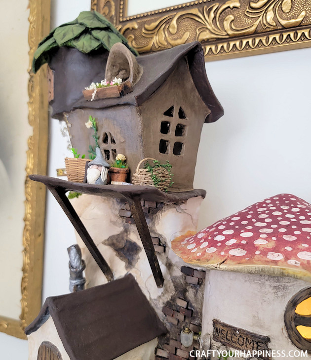 This hanging wall village sculpture is the FIRST in our new category "Get Inspired!" It's handmade from clay!