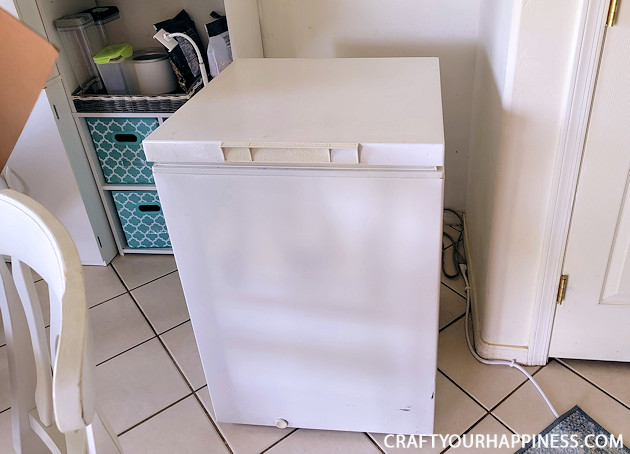 Learn how to make a chest freezer cover that lifts and can be painted or covered any way you like!  (It can also conceal an inventory list.)