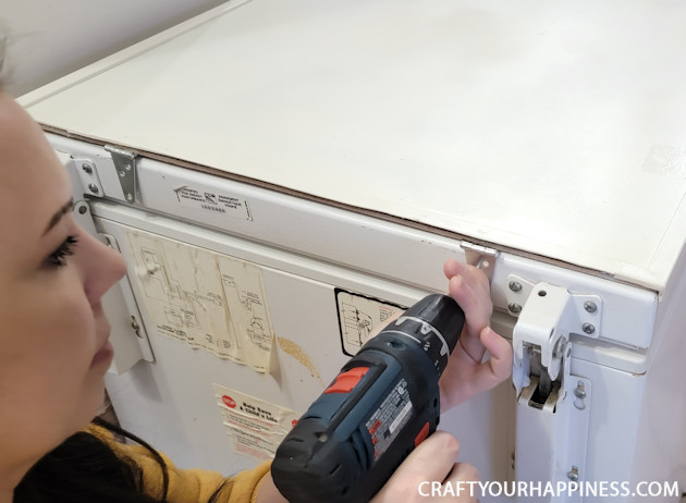 Learn how to make a chest freezer cover that lifts and can be painted or covered any way you like!  (It can also conceal an inventory list.)