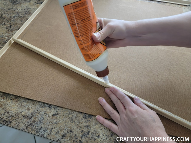 Learn how to make a chest freezer cover that lifts and can be painted or covered any way you like!  (It can also conceal an inventory list.)