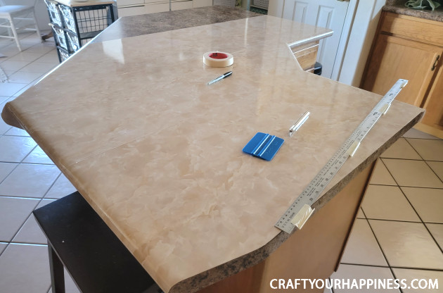 Learning how to cover a countertop with contact paper is easier than you think! It can last a long time if you're careful with it!