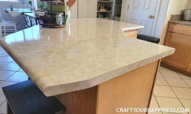 Learning how to cover a countertop with contact paper is easier than you think! It can last a long time if you're careful with it!